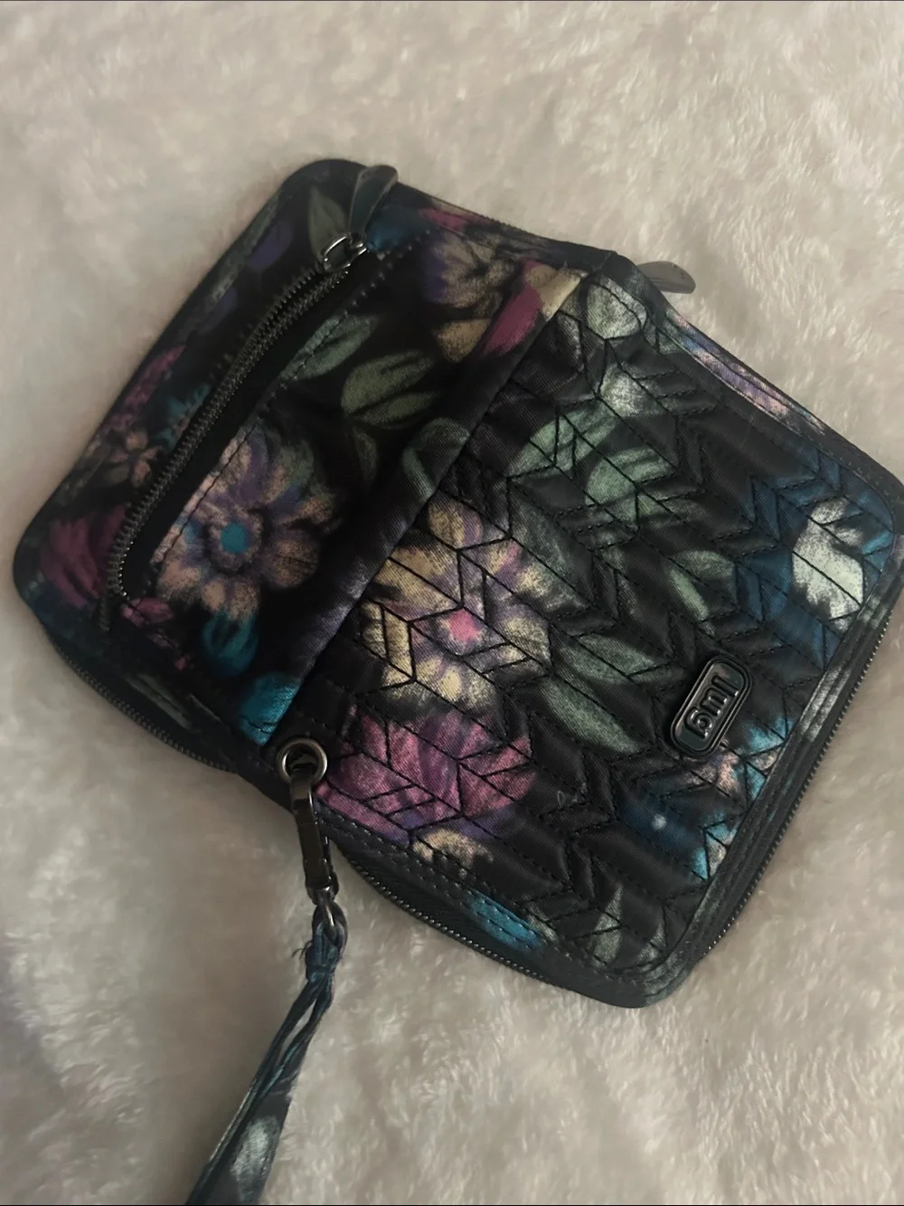 lug Quilted Floral Wristlet in Black with Multicolor Floral Accents